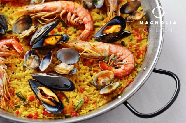 Typical spanish seafood paella in traditional pan