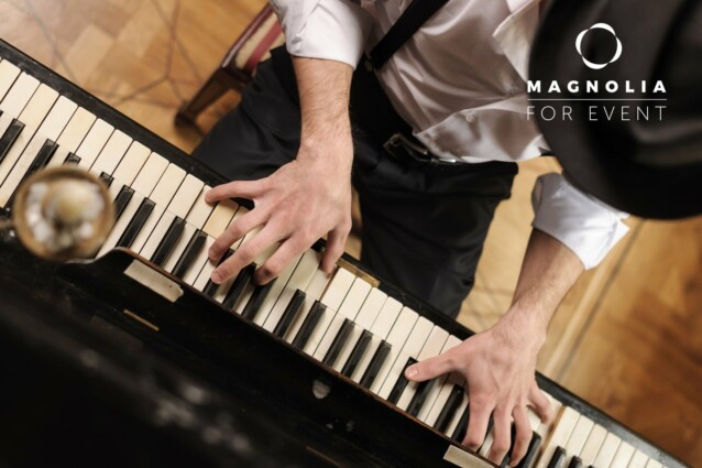 Talent and virtuosity. Top view of handsome young men playing piano